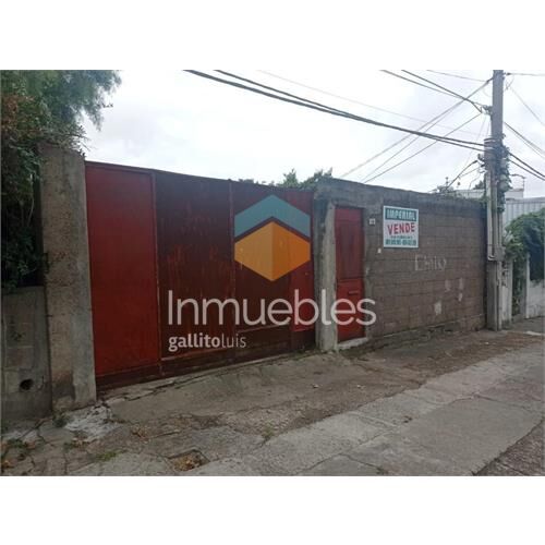 Terreno con mejoras